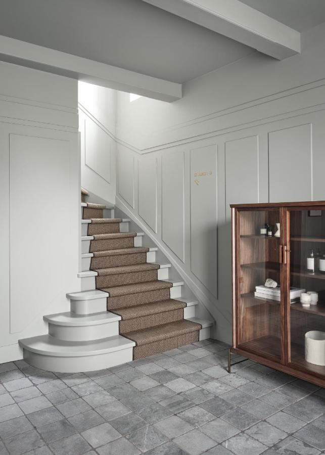 Boutique Hotel Benedict Noordwijk Extérieur photo A carpet runner on a staircase